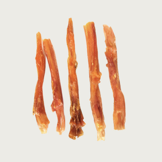 Five bully strap dog chews, side by side to show natural size and shape variation.