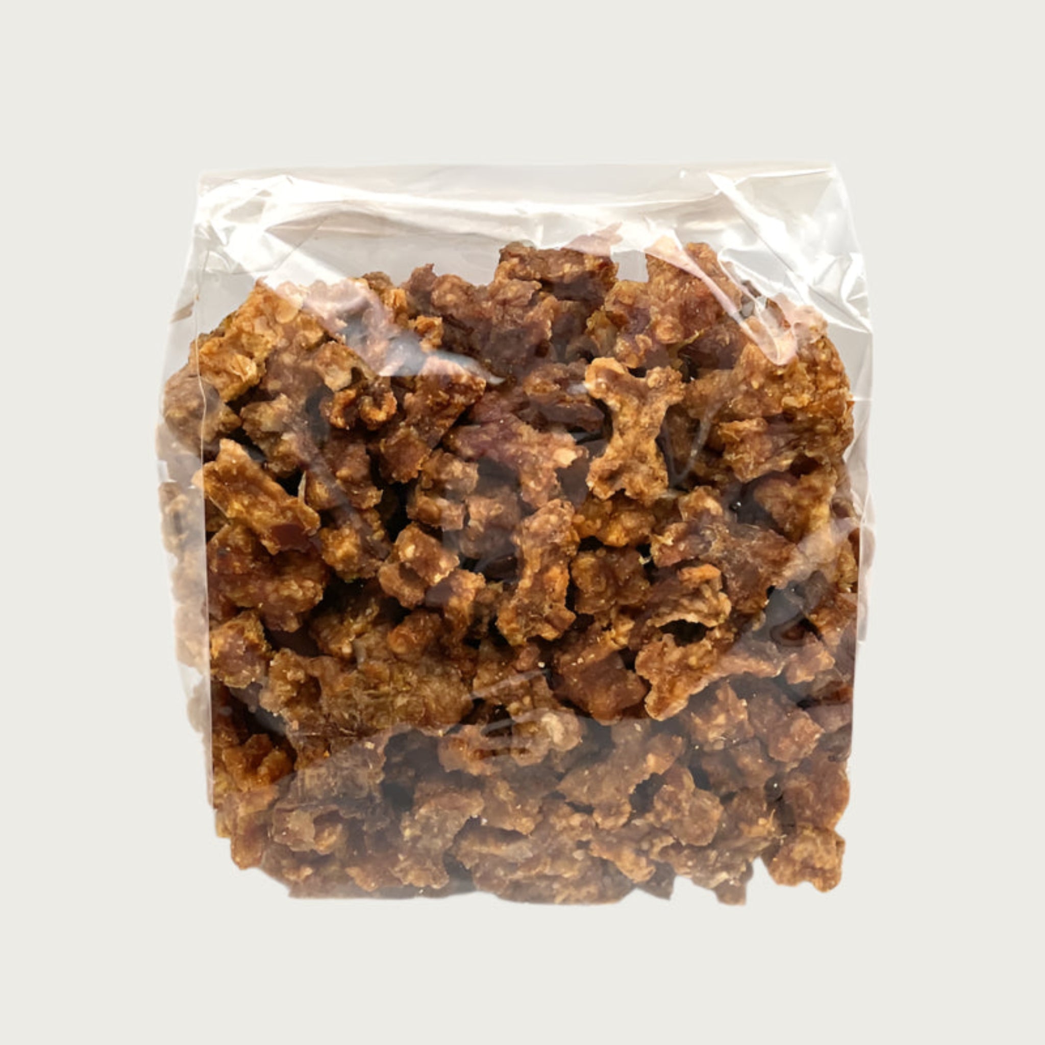 6 oz clear cellophane bag of Wet Nose exclusive Teeny Meaties turkey treats for dogs. Product inside is very small, brown, bone-shaped treats.
