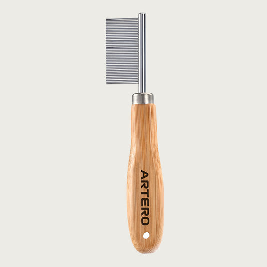Pet grooming comb with ergonomic wooden handle and silver comb. The small comb section is attached like a flag to the wood handle. Tines are densely placed, and all one length.