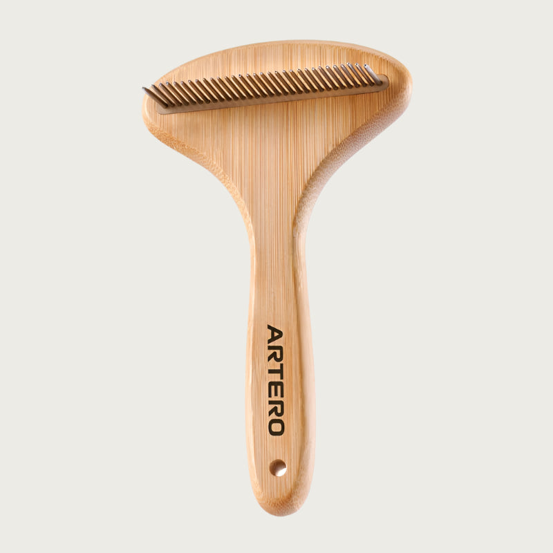 Pet grooming rake with bamboo body and single-row, thicker tooth comb, that runs horizontally (perpendicular to the handle).