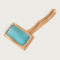 Load image into Gallery viewer, Pet slicker brush with bamboo body & handle and teal rubber pad with thin metal pins. Size S.
