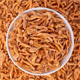 A plate full of Freeze-Dried Baby Shrimp from Arya! Sit. Overhead view, to show full detail. 1.5" - 2" long shrimp are whole body.
