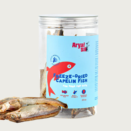 3 oz clear plastic container of Arya! Sit Freeze-Dried Capelin Fish. For dogs & cats. Single ingredient goodness. Whole body fish are visible inside the container - they are about 4"-5" long.