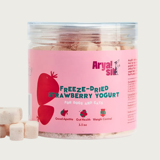 3.5 oz clear plastic container of Arya! Sit Freeze-Dried Strawberry Yogurt for Dogs & Cats. Good appetite, gut health, weight control. Product inside is visible; they are small pale pink cubes.