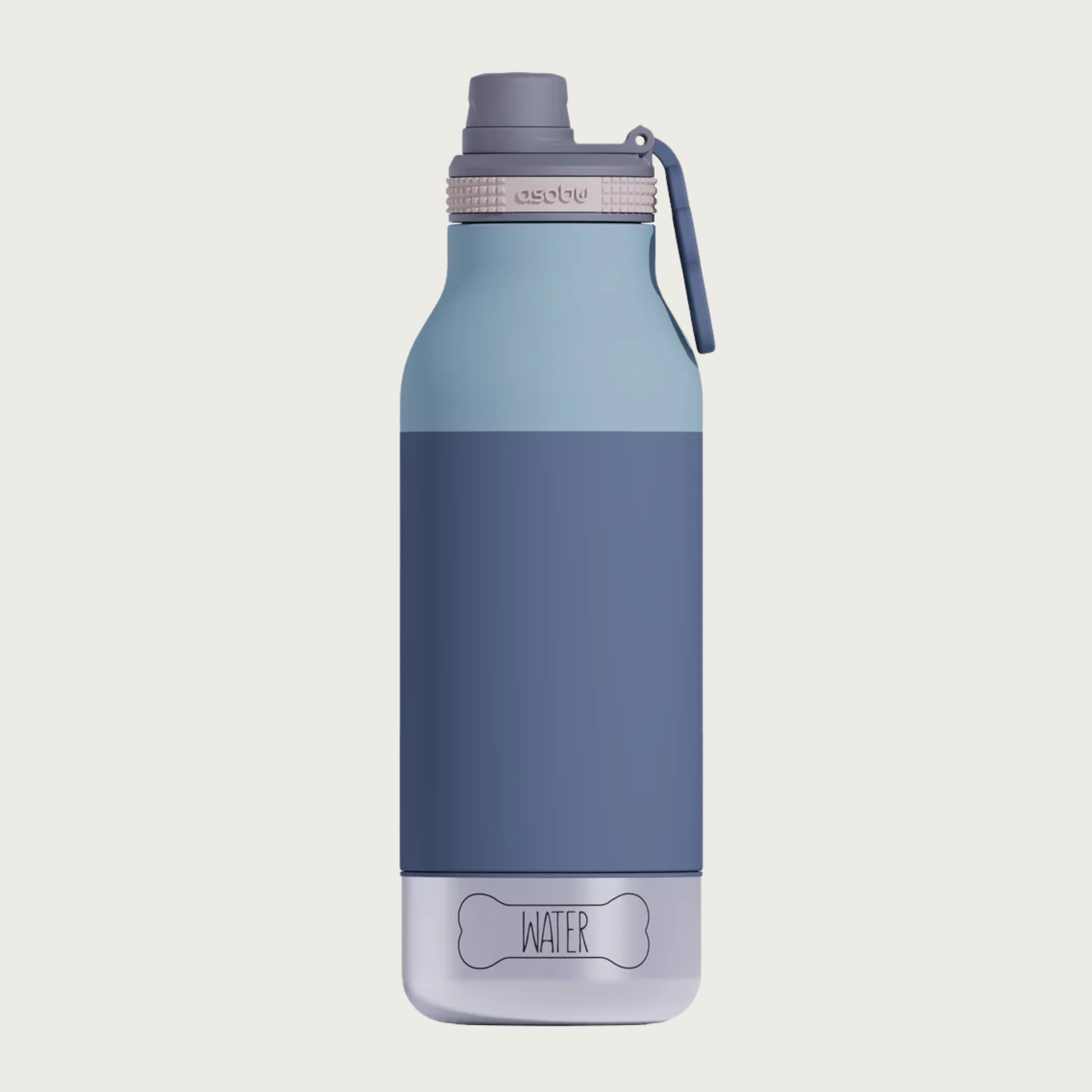 A light blue & medium grayish-blue insulated water bottle with a gray lid & drinking spout and a small, hollow, light blue, paw print shaped flip-up handle. The base is a small stainless steel bowl that screws into the bottle, with the outline of a dog bone with the word 'WATER' in its center. The steel bowl is flush with the sides of the water bottle - no part of it sticks out.