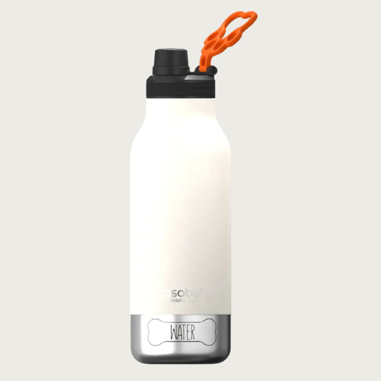 A white insulated water bottle with a black lid & drinking spout and a small, hollow, orange, paw print shaped flip-up handle. The base is a small stainless steel bowl that screws into the bottle, with the outline of a dog bone with the word 'WATER' in its center. The steel bowl is flush with the sides of the water bottle - no part of it sticks out.