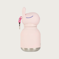 Load image into Gallery viewer, Side view of the Mini Bestie Bottle Bunny, showing it's closed eyes (curved purple line), dimensions of its ears, and bright pink loop on the back of the cap, where the keyring is attached.
