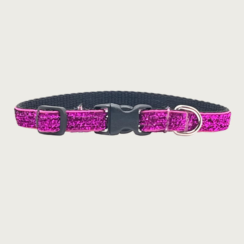 Skinny, hot pink (fuchsia) hued glitter teacup dog collar with a small D-ring, black nylon inner webbing and black plastic buckle. The fabric itself is shimmery & glittery - it is not glued on.