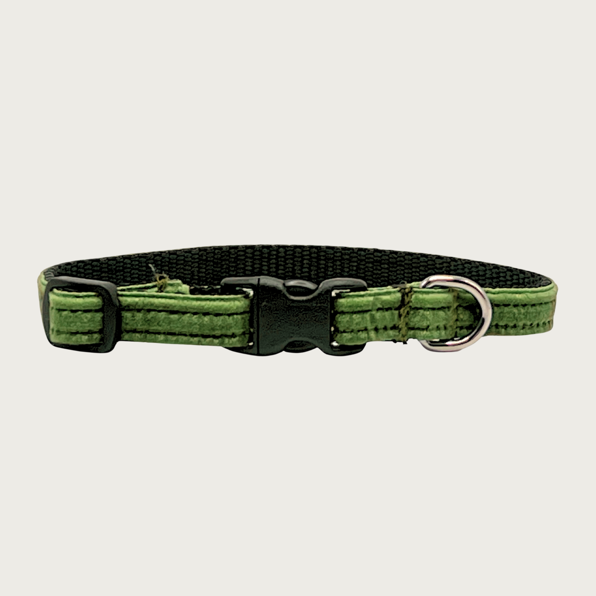 Skinny, moss green hued velvet teacup dog collar with a small D-ring, black nylon inner webbing and black plastic buckle.