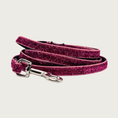 Load image into Gallery viewer, Skinny, rosy pink hued glitter dog leash with black nylon inner webbing and silver metal clasp. The fabric itself is shimmery & glittery - it is not glued on.
