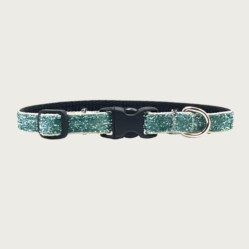 Skinny, seafoam green hued glitter teacup dog collar with a small D-ring, black nylon inner webbing and black plastic buckle. The fabric itself is shimmery & glittery - it is not glued on.