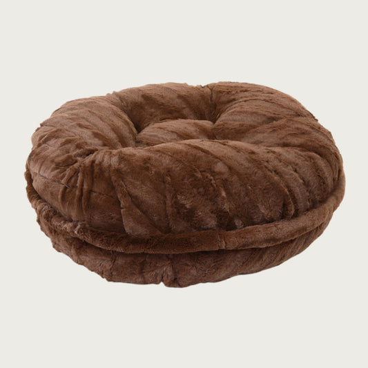 Side view of the Bagel Bed in Chocolate Mink. A ring of fabric goes along the center edge of the bed, hiding the zipper.