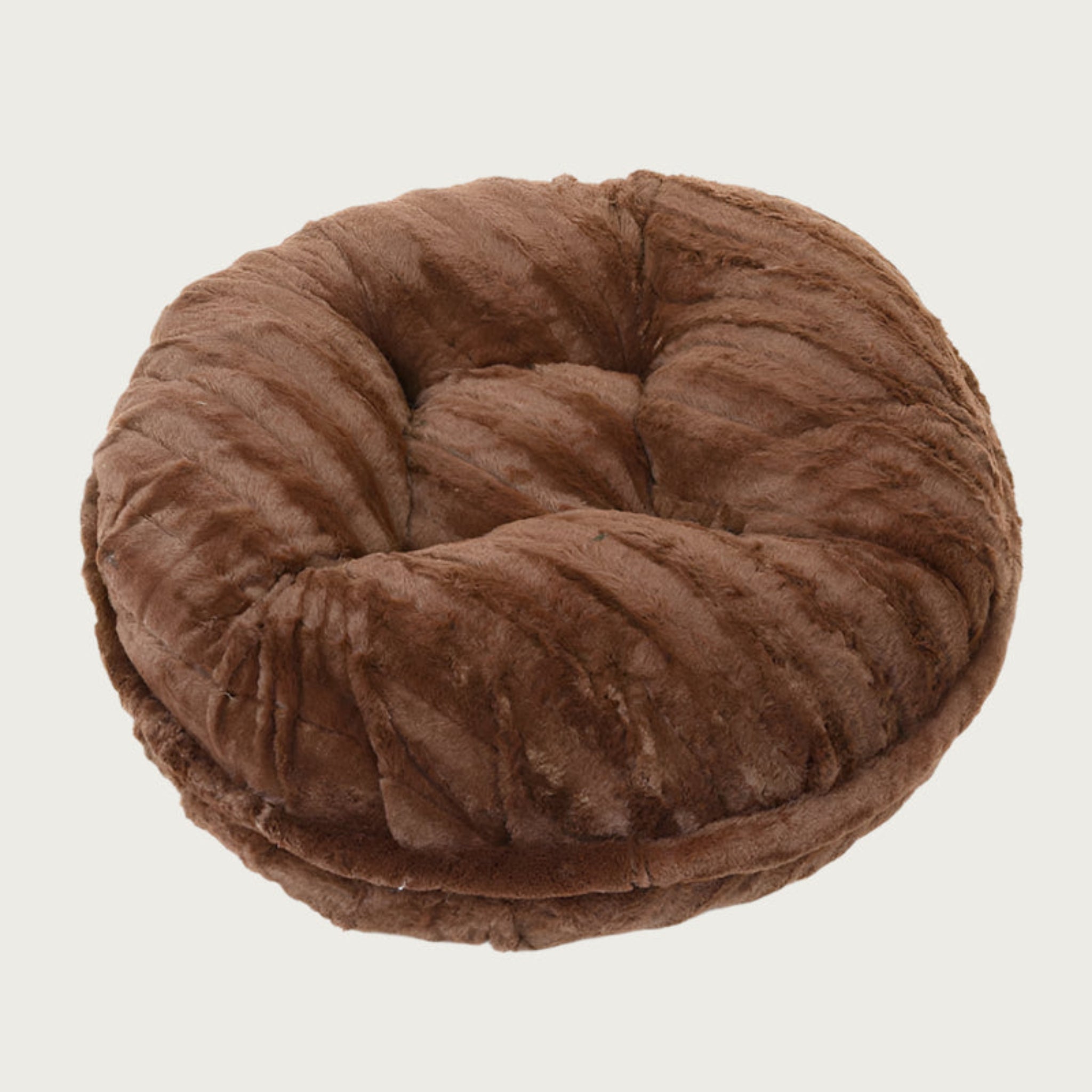 Round, chocolate brown colored plush pet bed with textured faux mink fur.