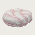 Load image into Gallery viewer, Side view of the Bagel Bed in Platinum Pink. A ring of fabric goes along the center edge of the bed, hiding the zipper.
