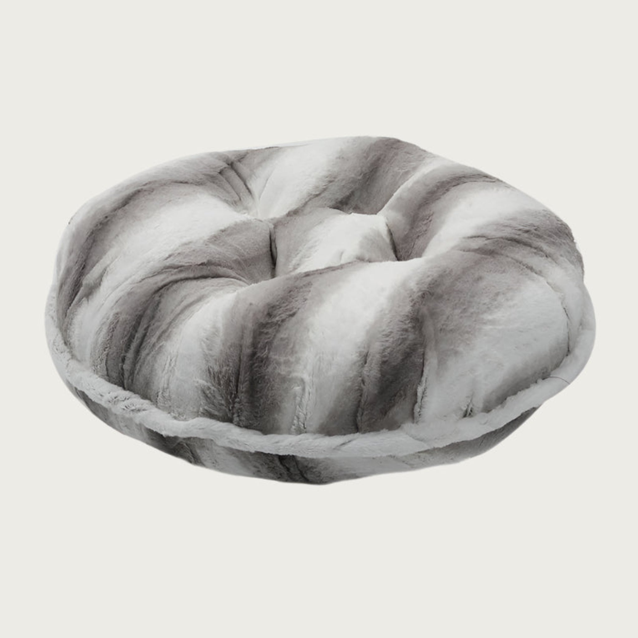 Side view of the Bagel Bed in Platinum Silver. A ring of fabric goes along the center edge of the bed, hiding the zipper.