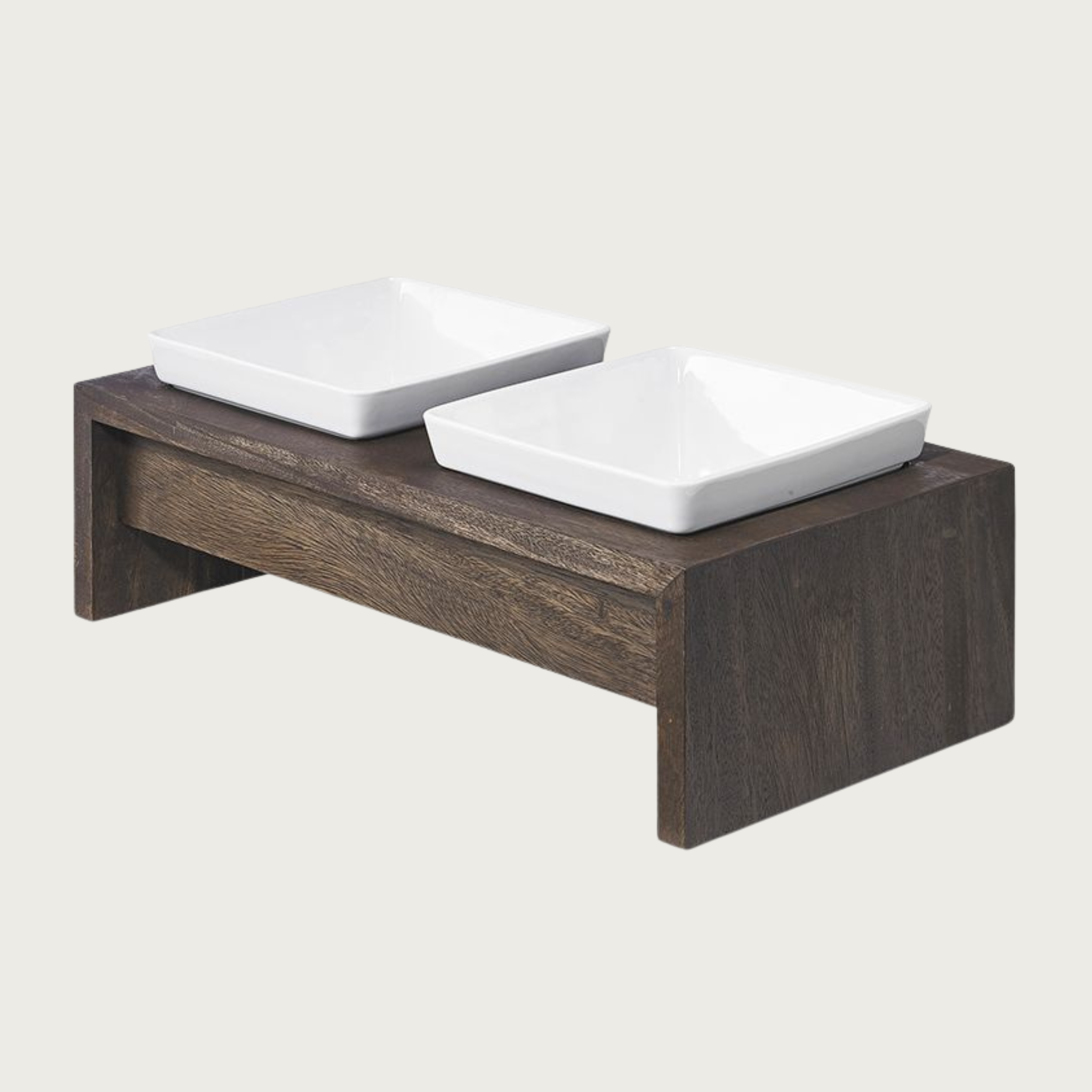 Medium double bowl, elevated dog feeder. Stand is a rich dark brown wood, in a simple rectangular design. With 2 square white ceramic bowls.