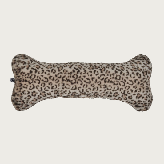 Leopard print, bone-shaped plush dog pillow, in shades of dark brown & beige.