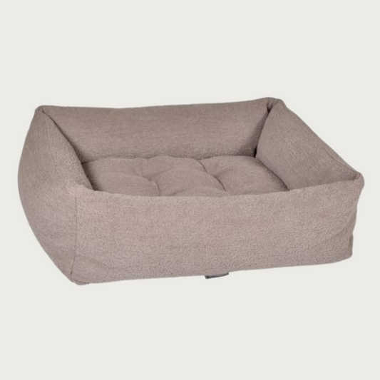 Latte (light grayish brown) colored, textured rectangular pet bed with bolsters & tufted center cushion.