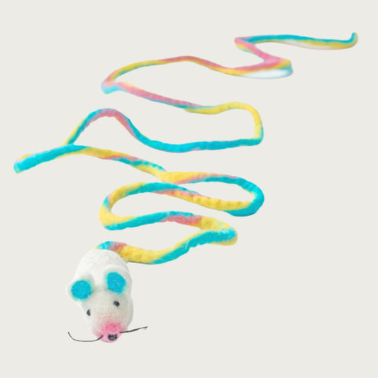 Wool mouse toy with its tail loosely curved & extended to show its length. The mouse's body is white with aqua blue inner ears, pink nose and black eyes, nose & whiskers. Tail is marbled shades of yellow, pink and aqua blue.
