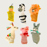 More examples of Barn Yarn Animal cat toys. There is a yellow duck, zebra, lion, llama, pig, and a donkey.