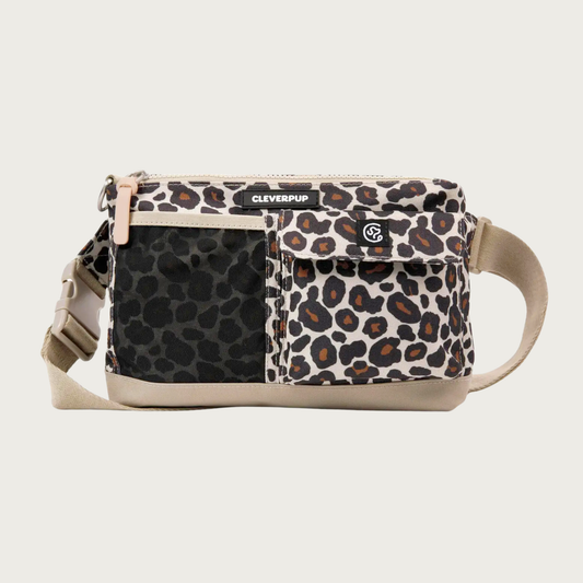 A leopard print (black spots with brown in centers, on beige background) crossbody bag with multiple front pockets (one black mesh and one with a flap closure), zippered top, and an adjustable strap. A black brand label reads 'CLEVERUP'.