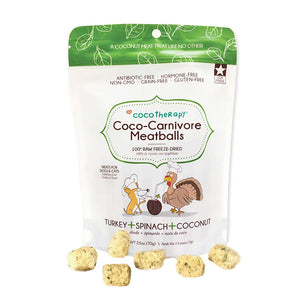 2.5 oz white and green bag of CocoTherapy Turkey + Spinach + Coconut Coco-Carnivore Meatballs treats for dogs & cats. 100% raw freeze-dried.  Made in USA. Sample treats in front of bag are beige, and look like small, uneven shaped nuggets.