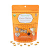 5 oz orange bag of CocoTherapy Coco-Charms Pumpkin Pie organic coconut training treats for dogs. Made with coconut & coconut oil. Grain-free, gluten free. USDA organic, made in USA. Sample of treats in front of bag are tiny (smaller than a dime) and tan colored, and in three shapes: hearts, stars and bones.
