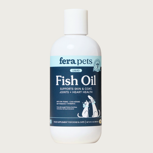White plastic bottle with blue label, of Fera Pet Fish Oil. Supports skin & coat, joints + heart health. Food supplement for dogs & cats. Veterinarian formulated. Net Wt. 8 oz.