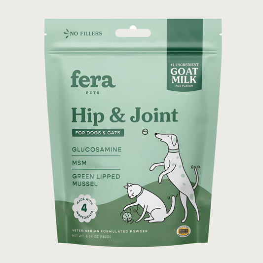 Two-toned green bag of Fera Pets Hip & Joint powder. Veterinarian created. Made with 4 ingredients: goat milk, glucosamine, MSM, and green lipped mussel. For dogs & cats.