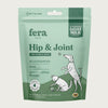 Two-toned green bag of Fera Pets Hip & Joint powder. Veterinarian created. Made with 4 ingredients: goat milk, glucosamine, MSM, and green lipped mussel. For dogs & cats.