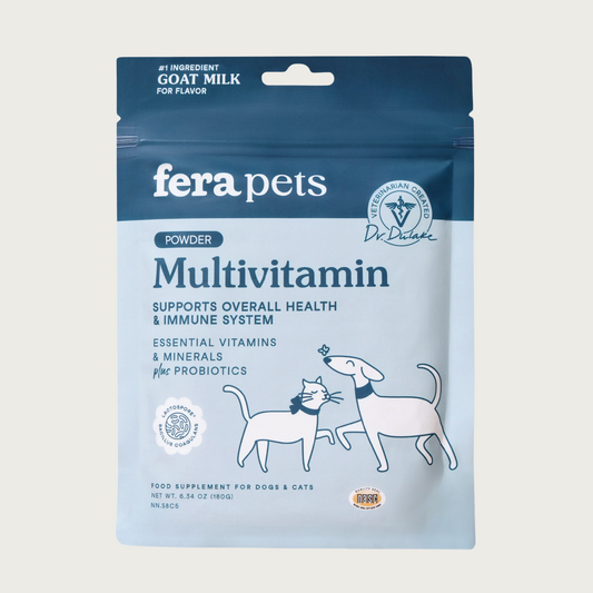 Two-toned blue bag of Fera Pets Multivitamin powder. Veterinarian created. Supports overall health & immune system. Essential vitamins & minerals plus probiotics. Food supplement for dogs & cats.