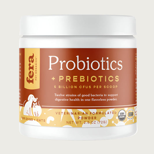 A white plastic container with burnt orange colored label, of Fera Pets Probiotics + Prebiotics. 5 Billion CFUs per scoop. Twelve strains of good bacteria to support digestive health in one flavorless powder. For Dogs & Cats. Veterinarian formulated. Net wt. 2.5 oz.