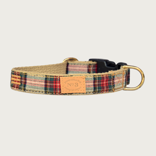 Dog collar with a classic Stewart plaid print, in shades of red, green, white, black, yellow and blue.