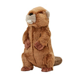 Plush Troy Beaver dog toy from Fluff & Tuff. Toy is all brown, with a darker flat tail, tan ears and muzzle, with white "buck tooth", black nose, and black & yellow eyes.