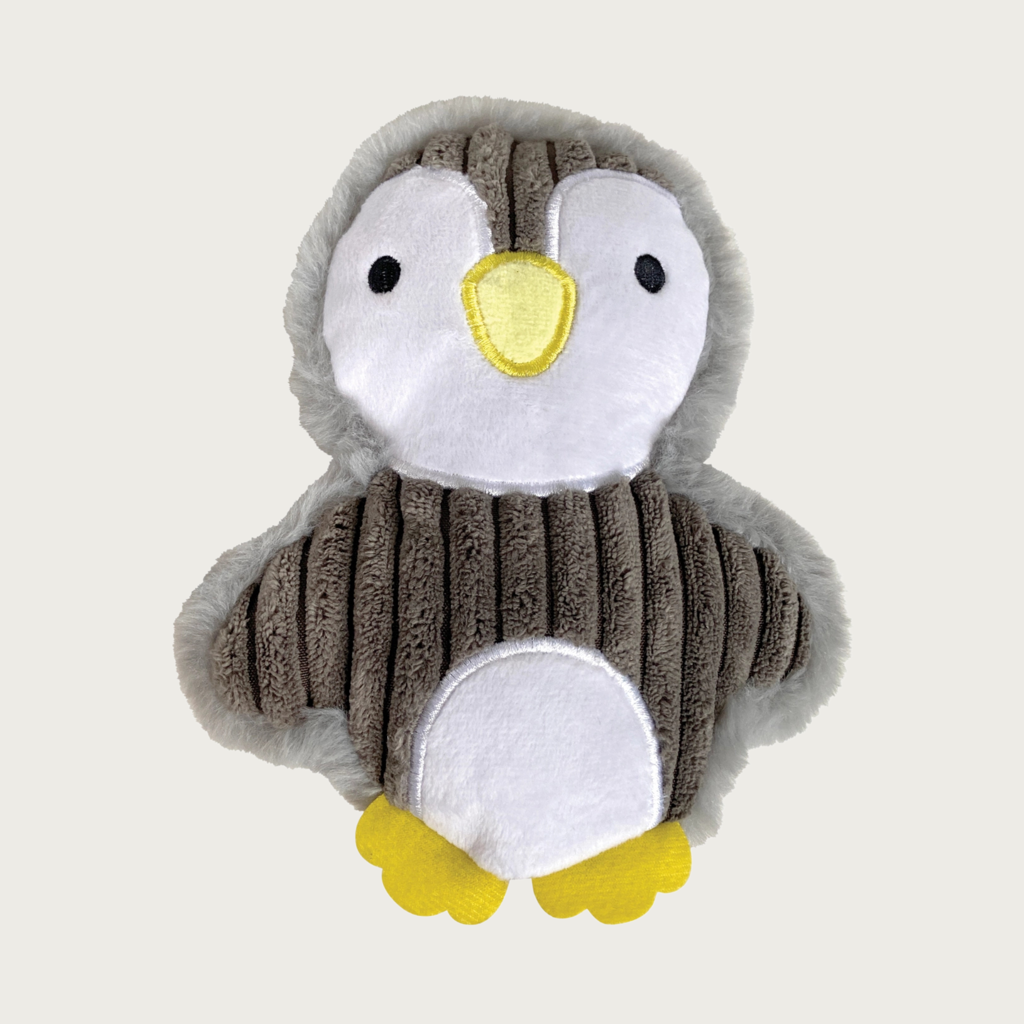Plush dog toy shaped like a small penguin standing up, with a gray corduroy body with white belly & face, trimmed in light gray plush, with yellow feet. Black embroidered eyes & yellow beak.