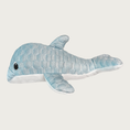Load image into Gallery viewer, Side (lengthwise) view of the Puff Plushies Dolphin dog toy. It is pale blue with a puffy, quilted texture, with embroidered eyes, and white belly.
