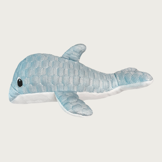 Side (lengthwise) view of the Puff Plushies Dolphin dog toy. It is pale blue with a puffy, quilted texture, with embroidered eyes, and white belly.