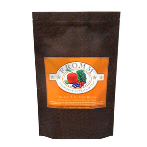 A 4 pound black and orange bag of Fromm Chicken a la Veg Recipe dog food.