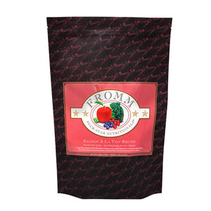 A 4 pound black and coral bag of Fromm Salmon A La Veg Recipe dog food.
