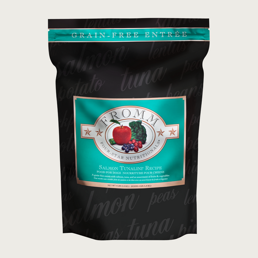 A 4 pound black and teal bag of Fromm Salmon Tunalini Recipe dog food. The banner on top of the bag reads "Grain-Free Entree".
