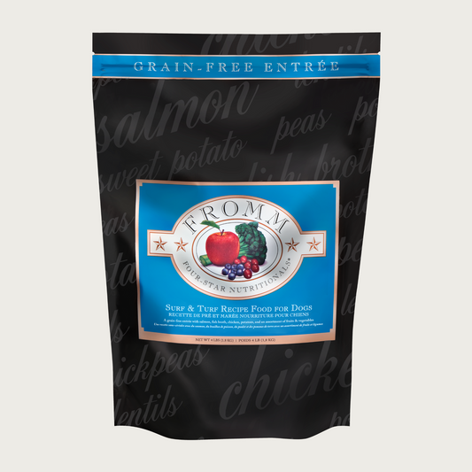 A 4 pound black and blue bag of Fromm Surf & Turf Recipe dog food. The banner on top of the bag reads "Grain-Free Entree".