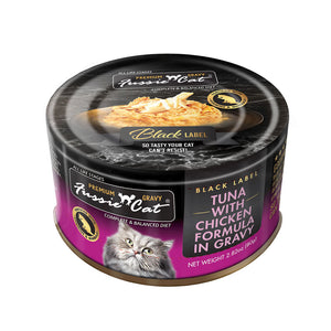 2.82 oz black & purple can of Fussie Cat Black Label Tuna with Chicken Formula in Gravy. Complete and balanced diet for all life stages. Fortified with vitamins and minerals. So tasty your cat can't resist! Small photo on top of can shows product inside - flakes and shreds of tuna and chicken in gravy.