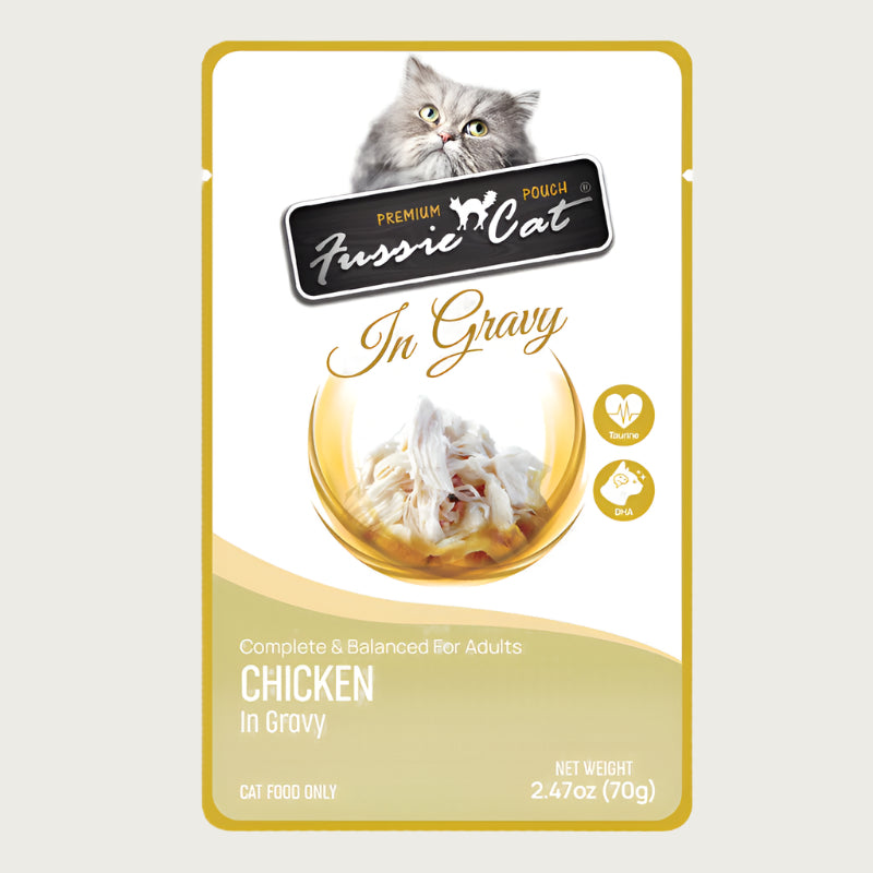 A 2.47 oz pouch of Fussie Cat complete & balanced adult cat food, chicken in gravy. Image in center shows shredded chicken.