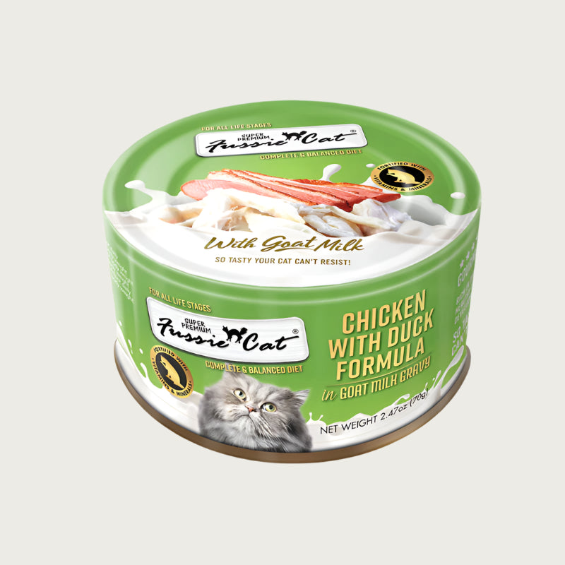 A 2.47 oz lime green can of Fussie Cat Chicken with Duck Formula in Goat Milk Gravy cat food. Super premium, for all life stages - "so tasty your cat can't resist!" Image on top of can shows flaked and shredded chicken and duck.