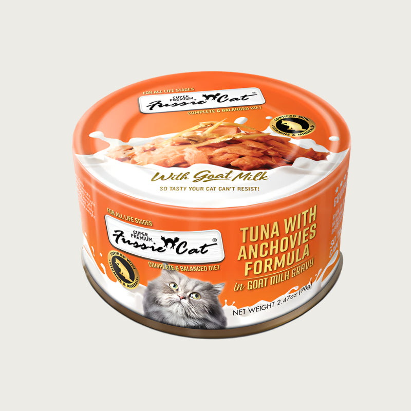 A 2.47 oz orange can of Fussie Cat Tuna with Anchovies Formula in Goat Milk Gravy cat food. Super premium, for all life stages - "so tasty your cat can't resist!" Image on top of can shows flaked tuna and anchovies.