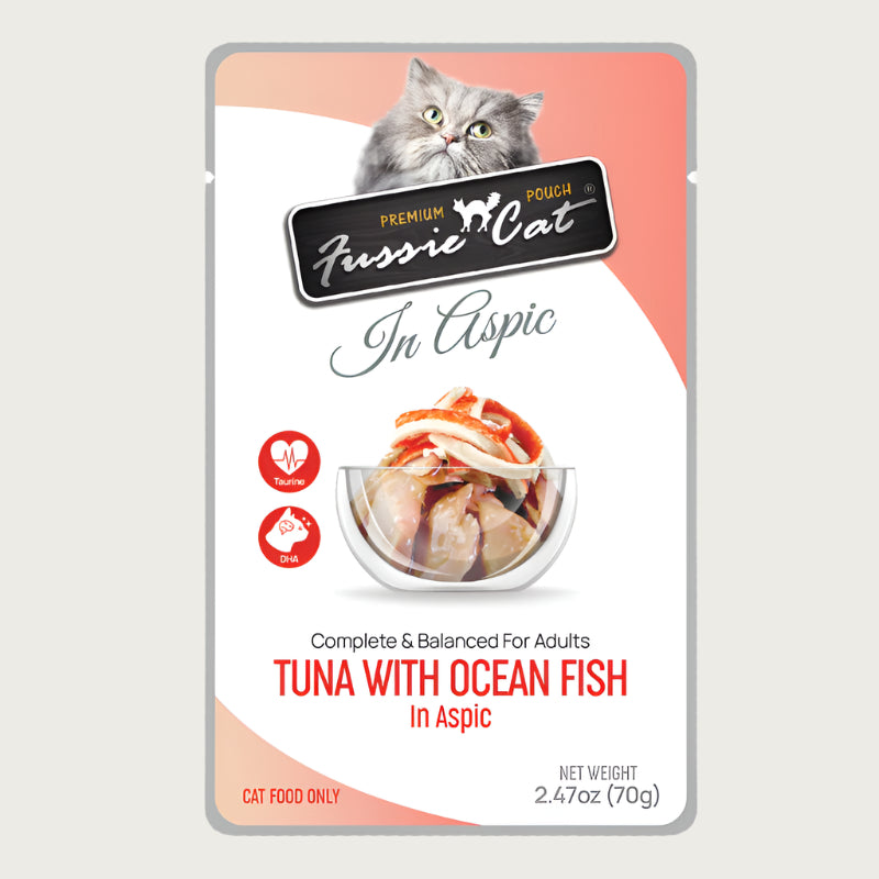A 2.47 oz pouch of Fussie Cat complete & balanced adult cat food, tuna with ocean fish in aspic. Image in center shows flaked tuna and fish.