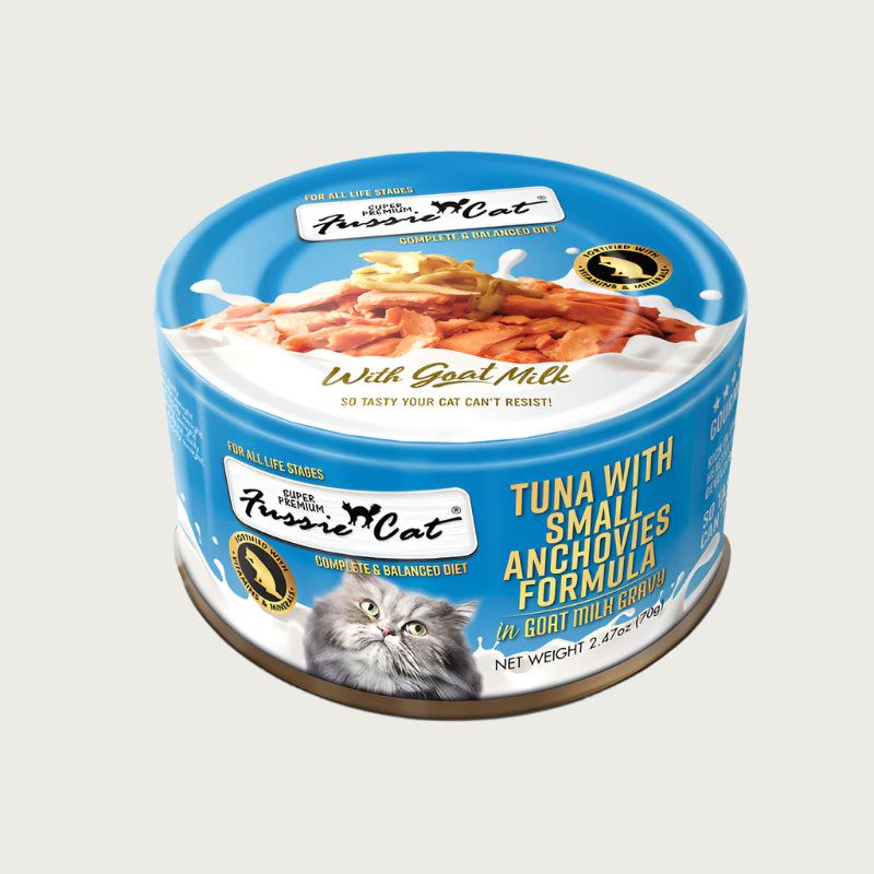 A 2.47 oz blue can of Fussie Cat Tuna with Small Anchovies Formula in Goat Milk Gravy cat food. Super premium, for all life stages - "so tasty your cat can't resist!" Image on top of can shows flaked tuna and small, whole anchovies.