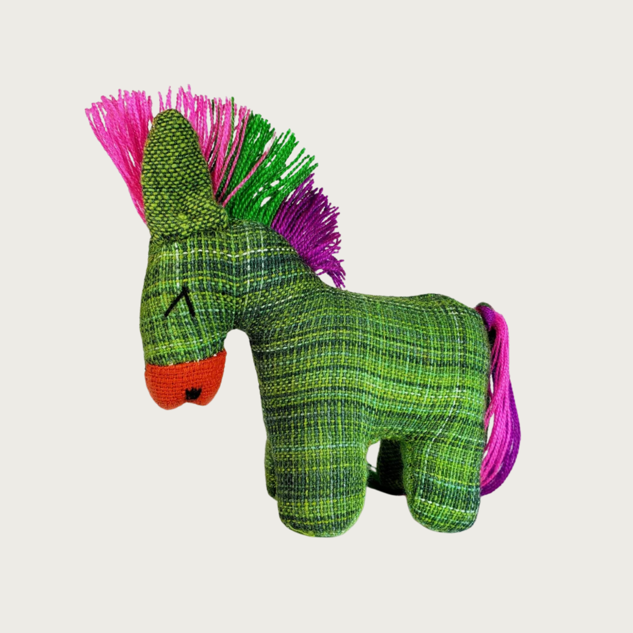 Dandi Donki woven fabric donkey cat toy in bright green with a vibrant multicolor mohawk-style mane and tail, and an orange nose and embroidered eyes.