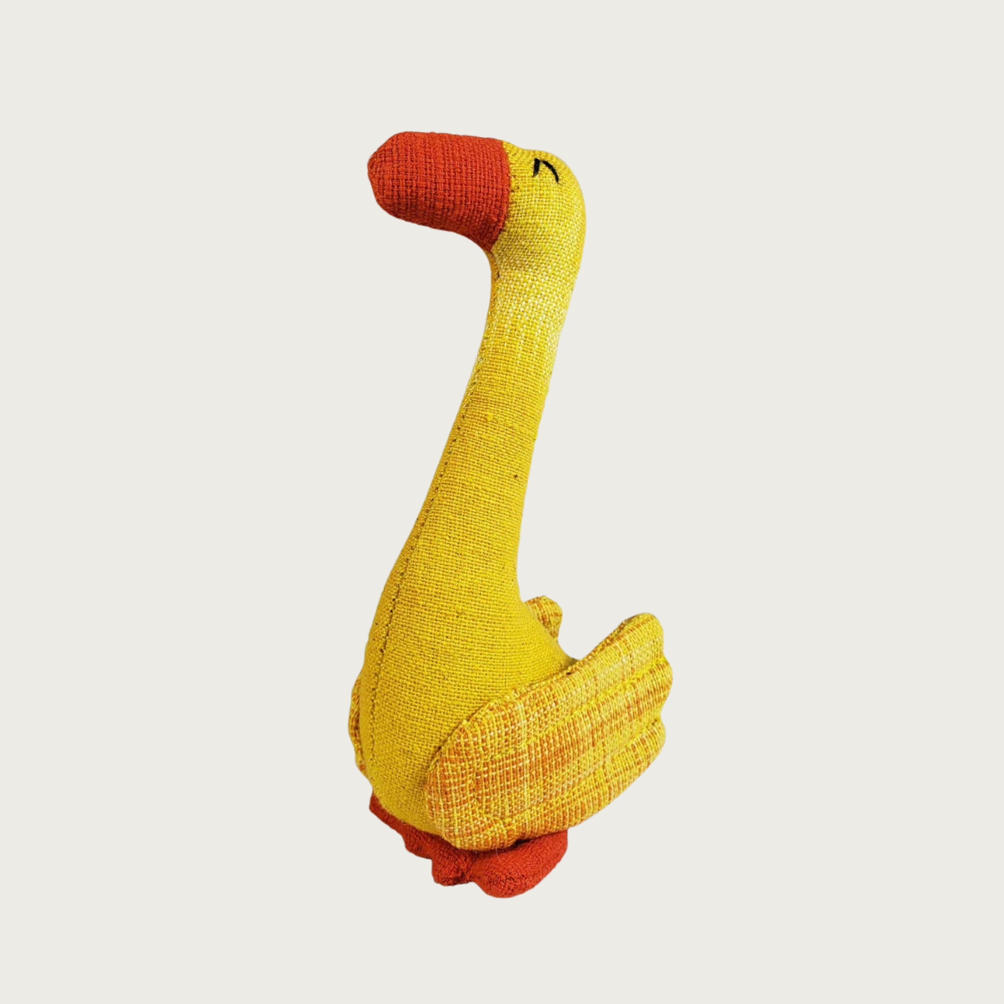 Silli Goose cat toy in bright yellow with orange beak and feet.