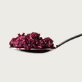 Load image into Gallery viewer, Close up of a spoon filled with Bam's Beets. It is coarsely chopped and burgundy in color.
